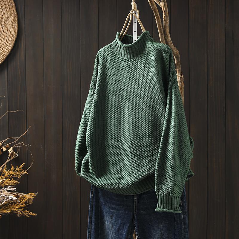 Maglione a collo alto con lavorazione a maglia a rombi tridimensionali