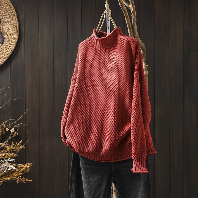 Maglione a collo alto con lavorazione a maglia a rombi tridimensionali