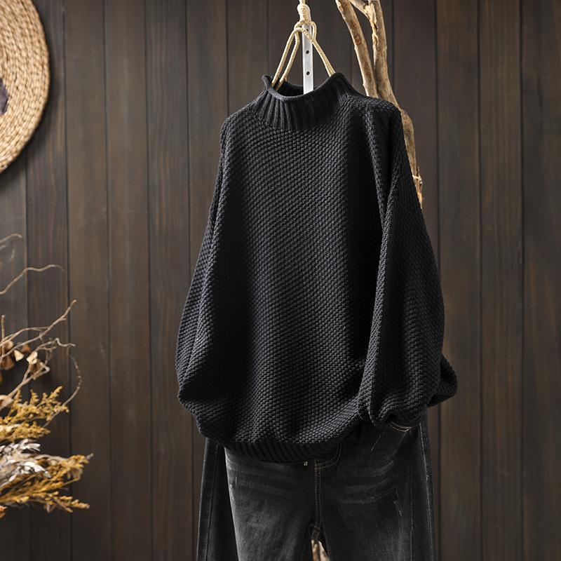Maglione a collo alto con lavorazione a maglia a rombi tridimensionali